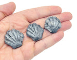 Larvikite gemstone sea shell carving, 30mm, from GemstoneGO, showcasing detailed shell design and polished surface.