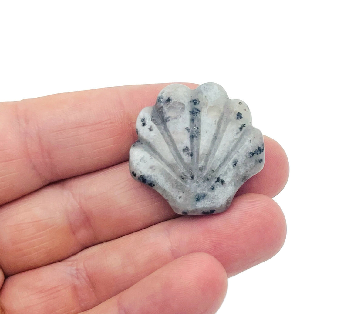 Kiwi Jasper Sea Shell carving gemstone 30mm from GemstoneGO, featuring a detailed sea shell design on polished stone surface.