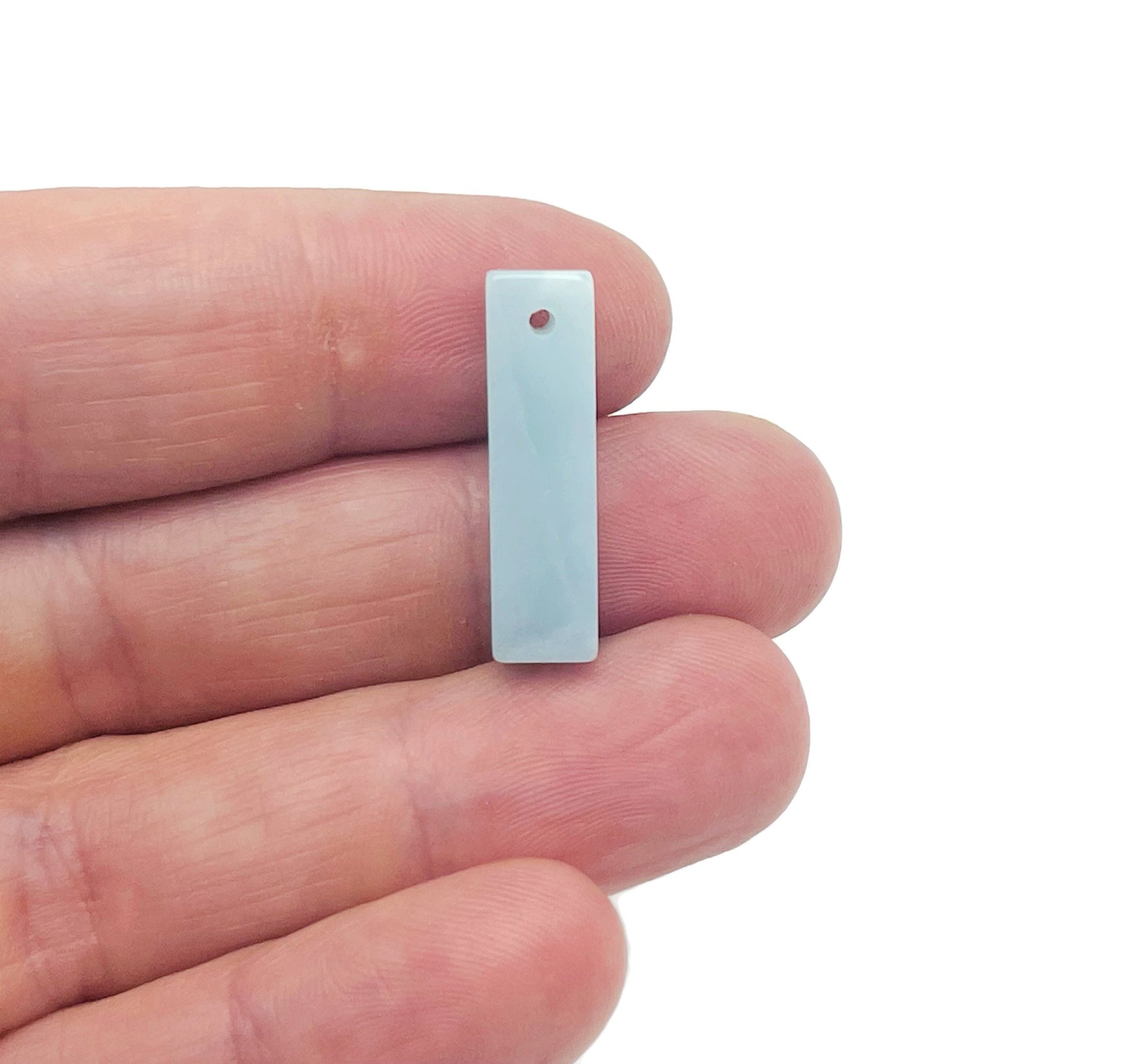 Amazonite crystal pendant from GemstoneGO, drilled gemstone for jewelry making, showcasing a smooth, polished blue-green stone.
