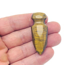 Carved Tiger Eye gemstone sword dagger measuring 50mm, featuring detailed craftsmanship and natural gemstone patterns.
