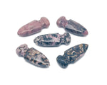 Carved Rhodonite sword dagger gemstone pendant, 50mm, with detailed craftsmanship and vibrant pink and black gemstone colors.