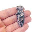 Carved Rhodonite gemstone sword dagger pendant, 50mm, featuring detailed carving and vibrant pink-red hues, by GemstoneGO.
