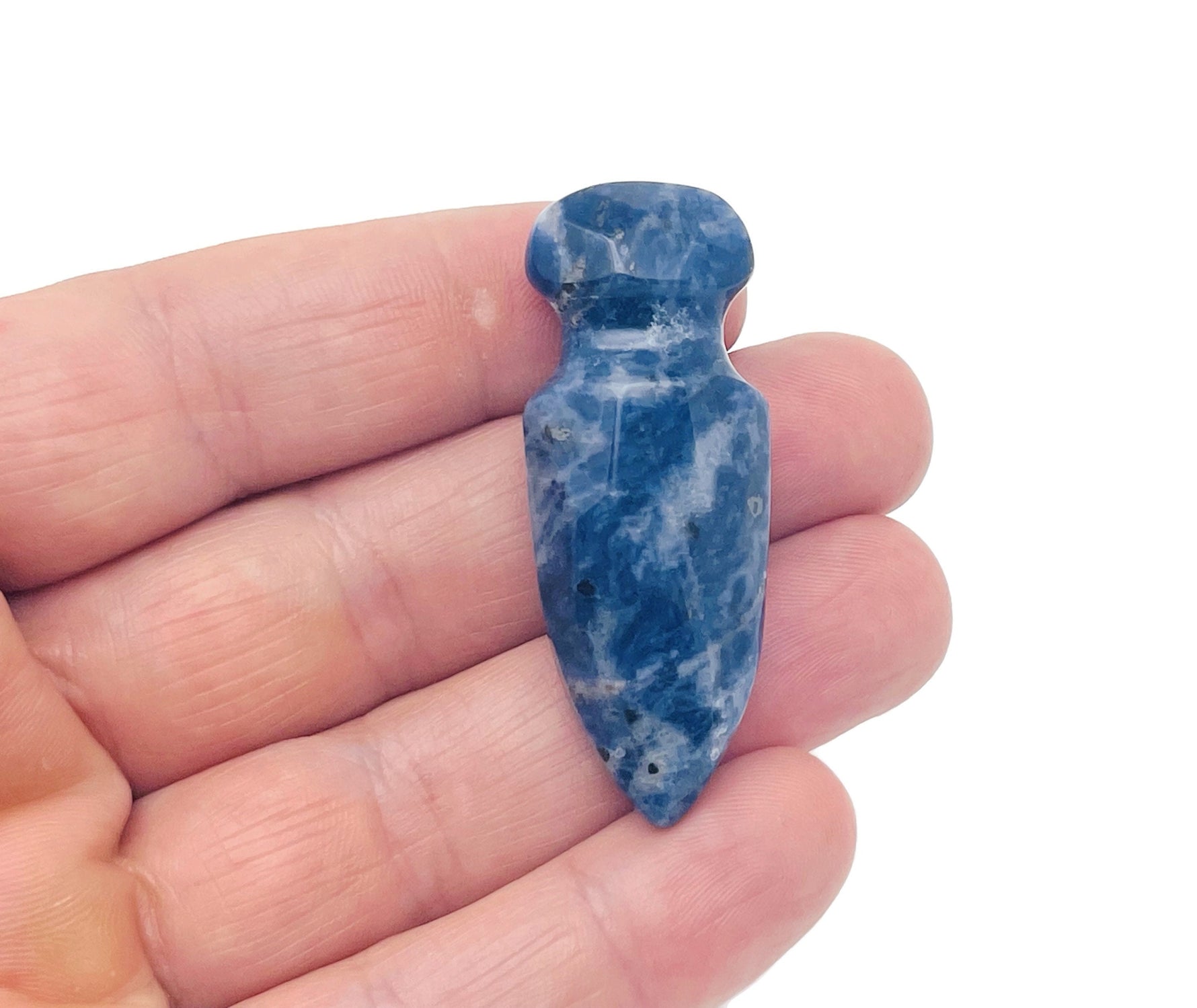 Carved Sodalite gemstone sword dagger pendant, 50mm, with intricate details and deep blue color, from GemstoneGO.