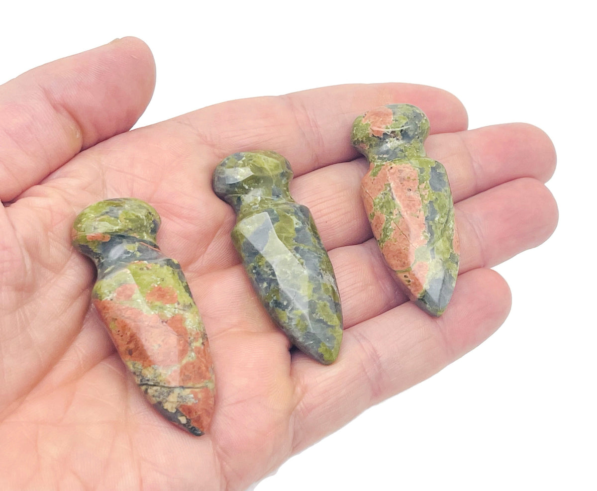 Carved unakite gemstone sword dagger pendant, 50mm, with detailed carving and vibrant green and pink hues.
