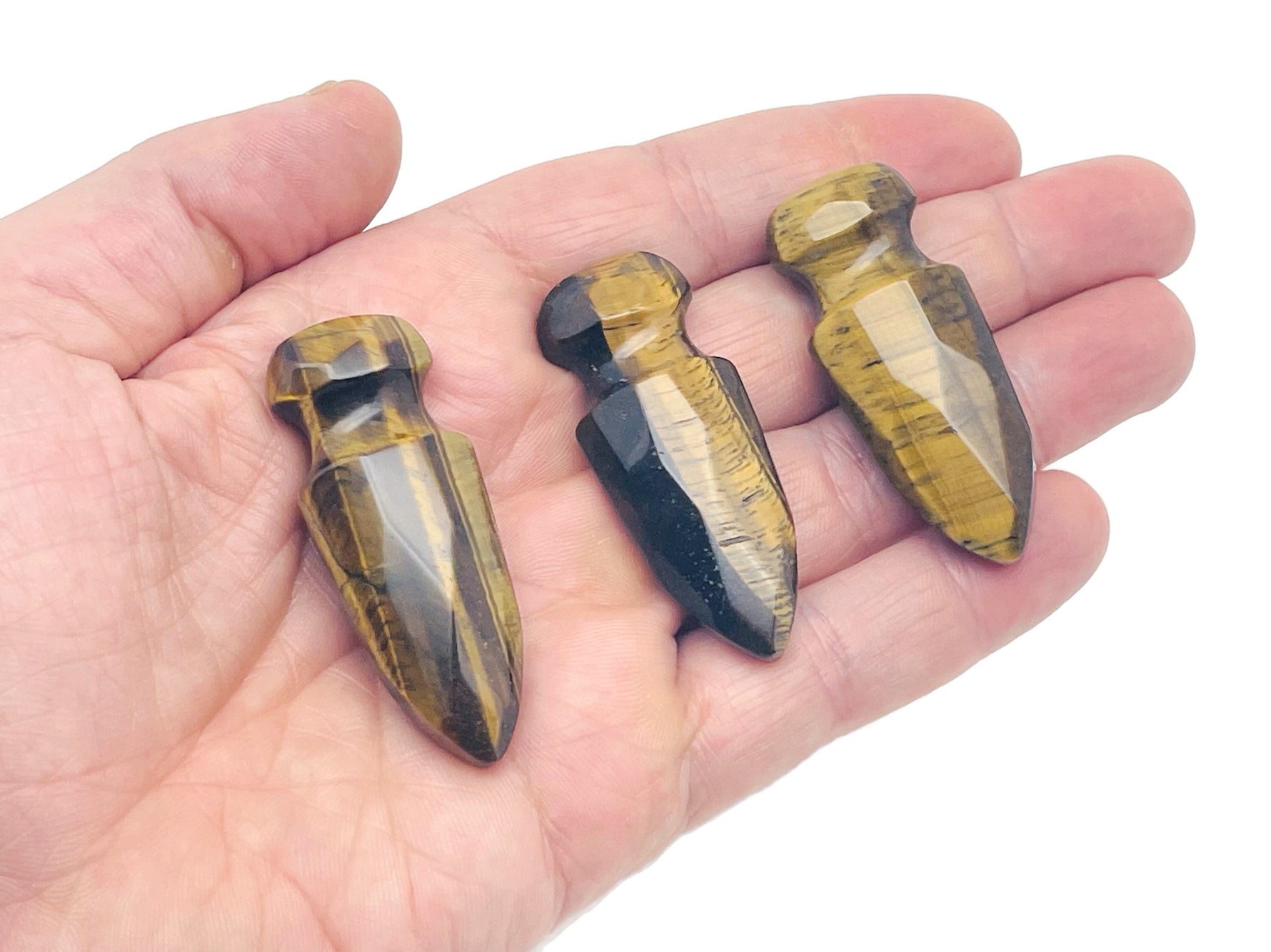 Carved gemstone sword dagger with crystal energy in a mineral specimen, 50mm size, from GemstoneGO, featuring colorful mixed gemstones.
