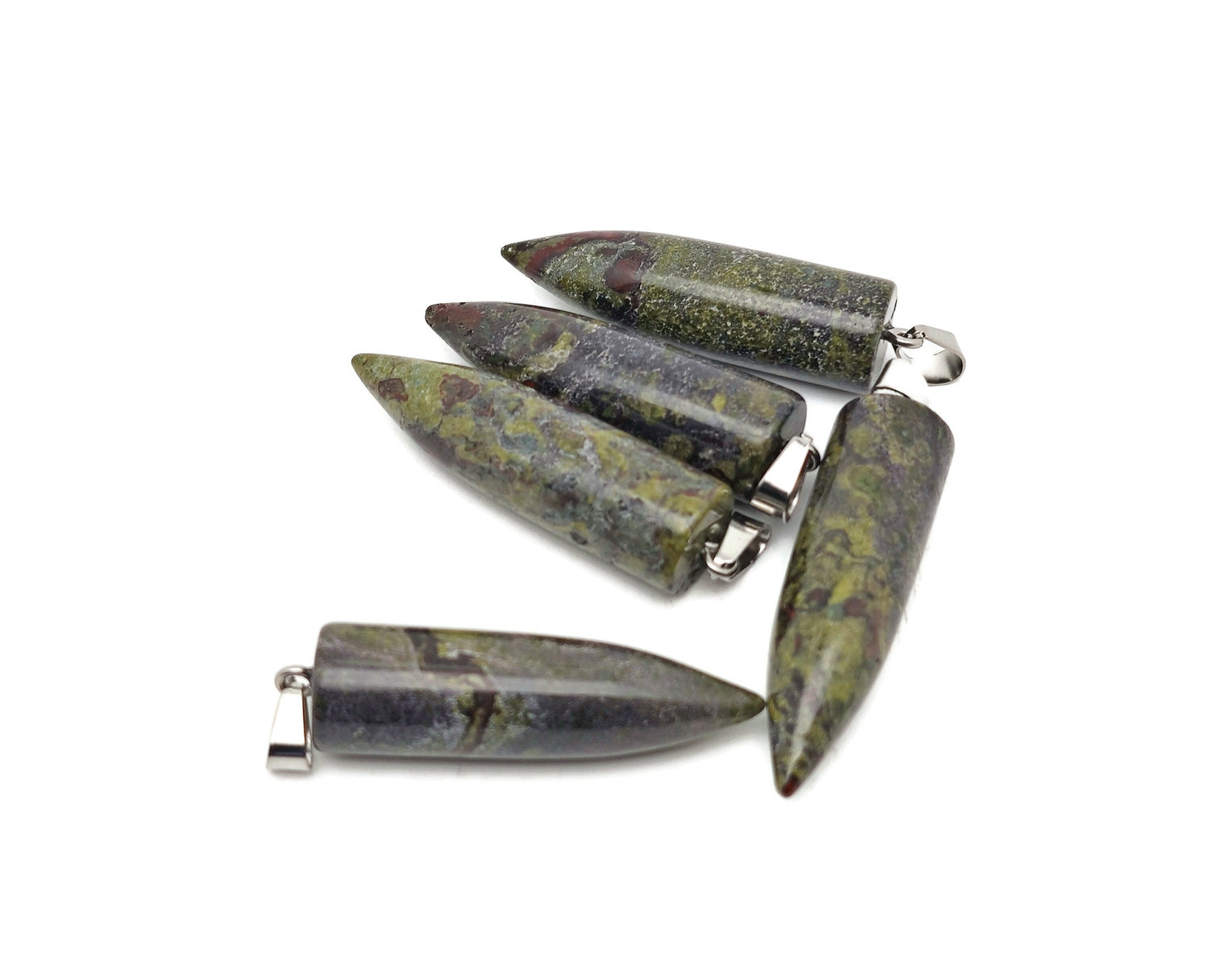 Polished Dragon Blood Jasper bullet gemstone pendant with carved details, featuring a vibrant red and brown natural stone design.