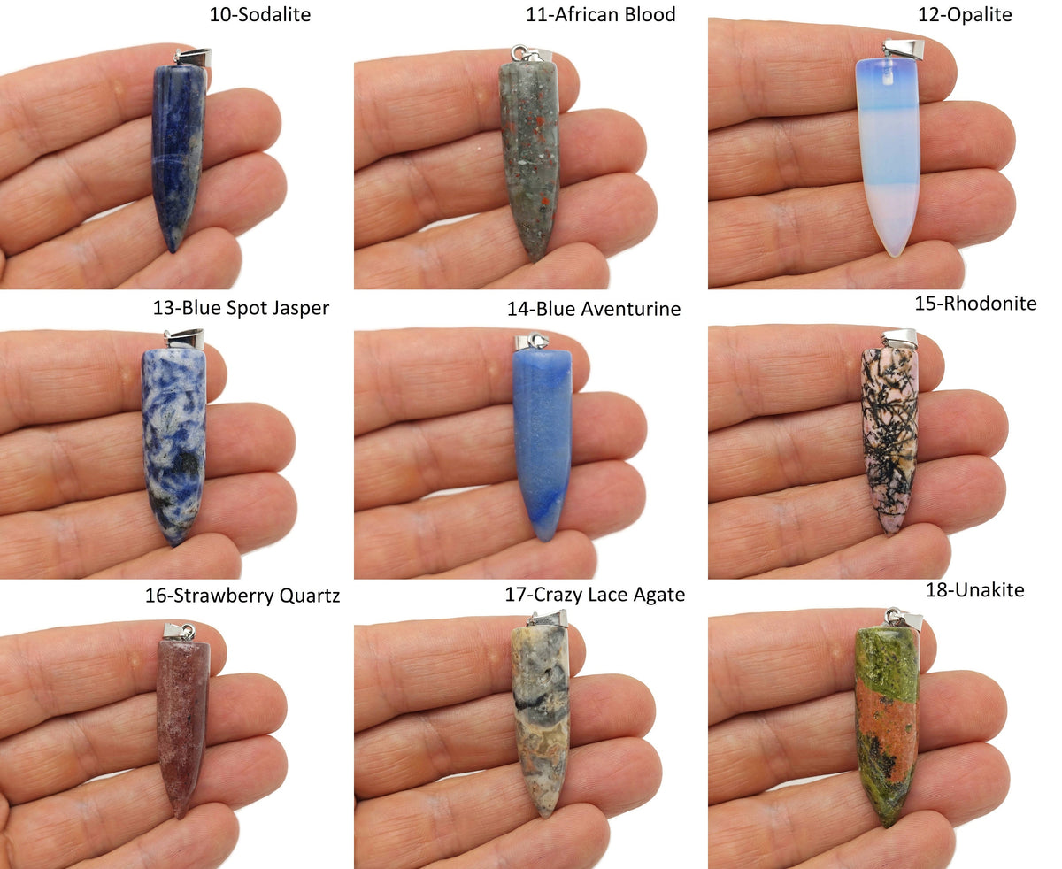 Polished gemstone bullet pendant with carved crystal healing mineral design, featuring vibrant mixed gemstone colors.