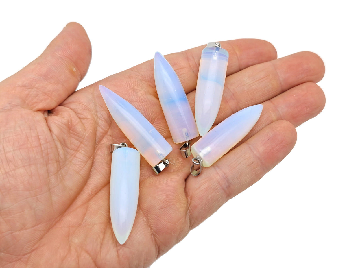 Polished bullet-shaped gemstone pendant with carved details, designed for crystal healing and mineral jewelry by GemstoneGO.