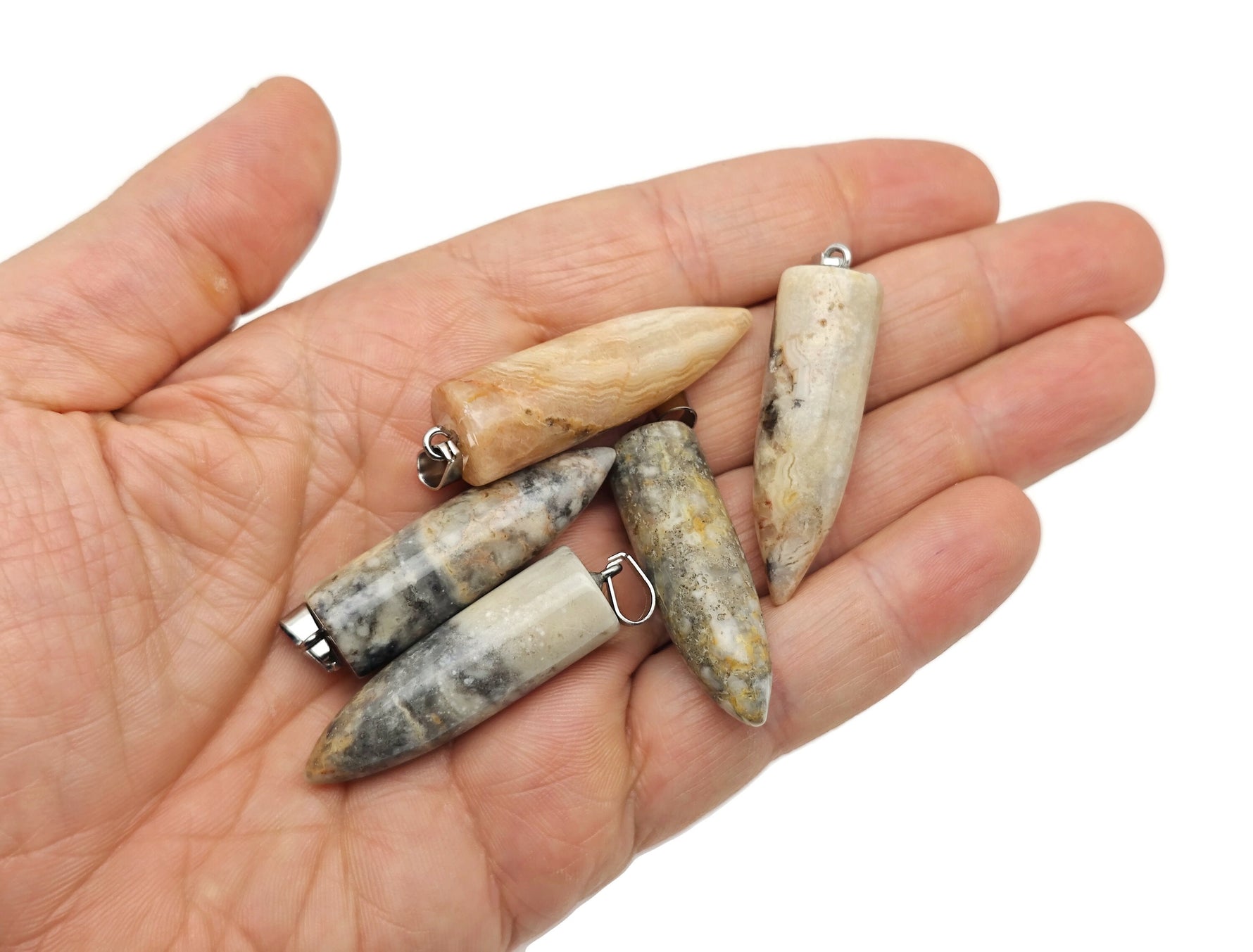 Polished gemstone bullet pendant with carved design, crystal healing mineral, from GemstoneGO, showcasing a smooth, rounded shape.