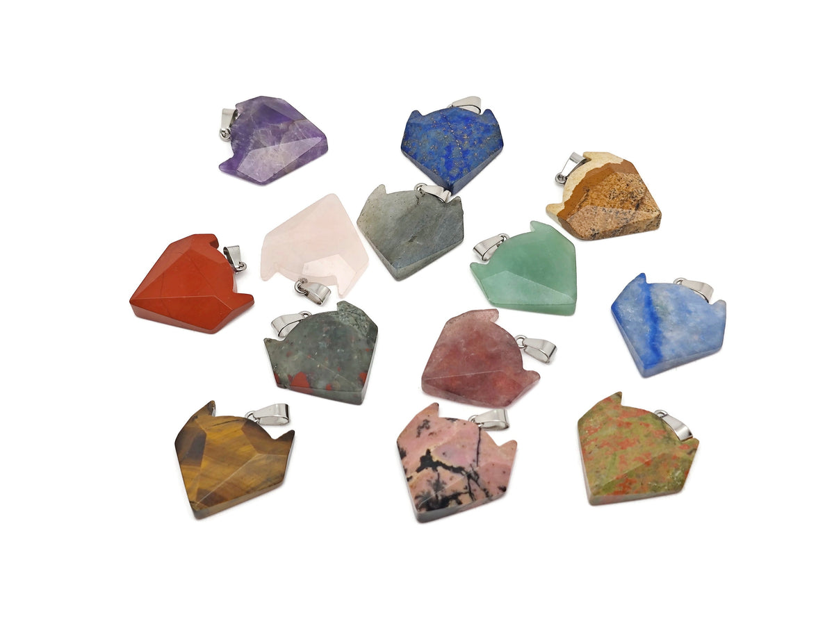 Crystal wolf head gemstone pendant from GemstoneGO, featuring detailed wolf design and vibrant gemstone craftsmanship.