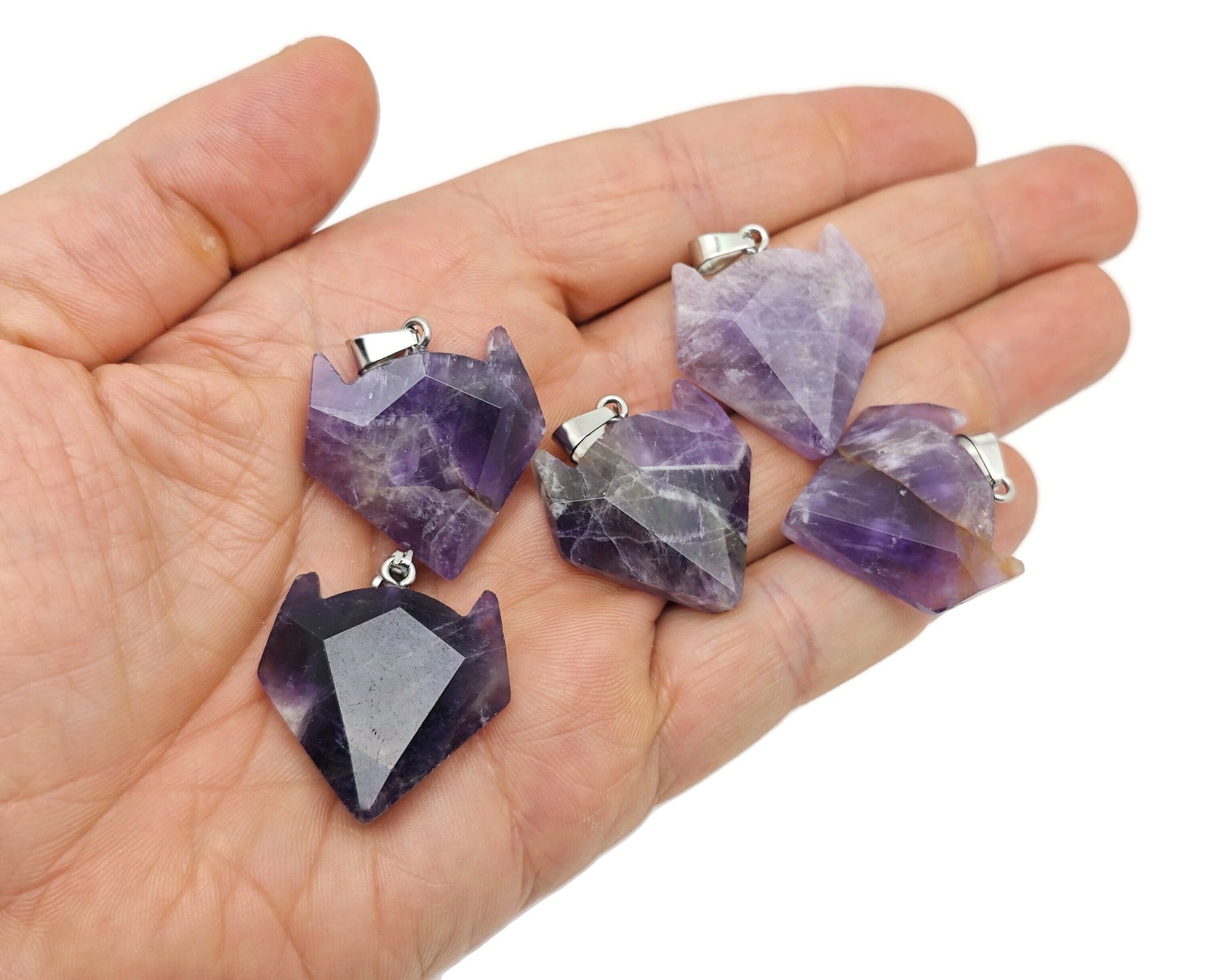 Crystal wolf head gemstone pendant from GemstoneGO, featuring detailed wolf design in sparkling crystal jewelry.