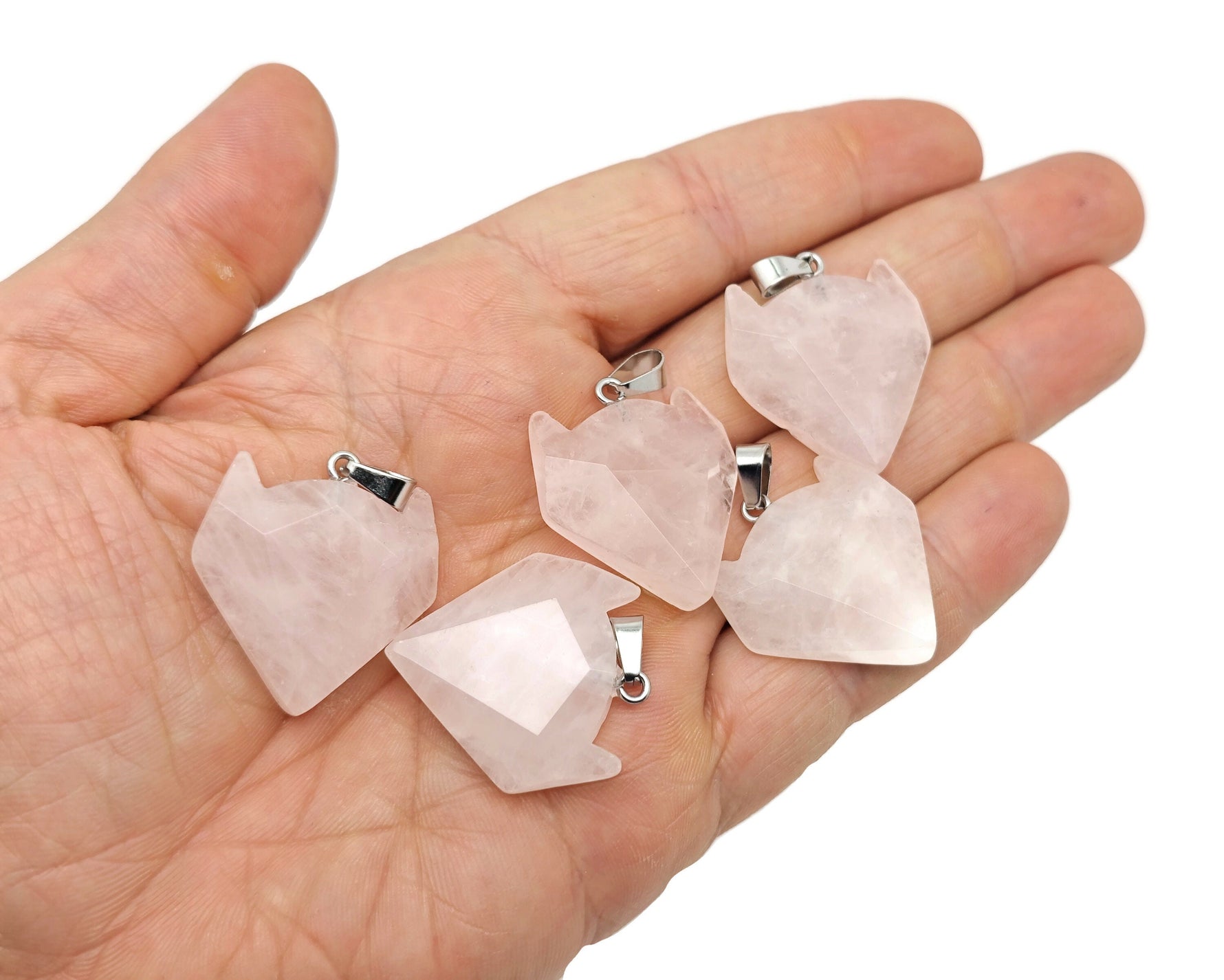 Rose quartz wolf head gemstone pendant, crystal jewelry featuring a detailed pink stone wolf design by GemstoneGO.
