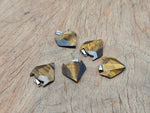 Tiger Eye wolf head gemstone pendant from GemstoneGO featuring a detailed crystal jewelry design with warm, golden-brown hues.