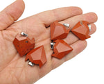 Red Jasper wolf head gemstone pendant from GemstoneGO featuring a detailed wolf design in vibrant red jasper crystal jewelry.