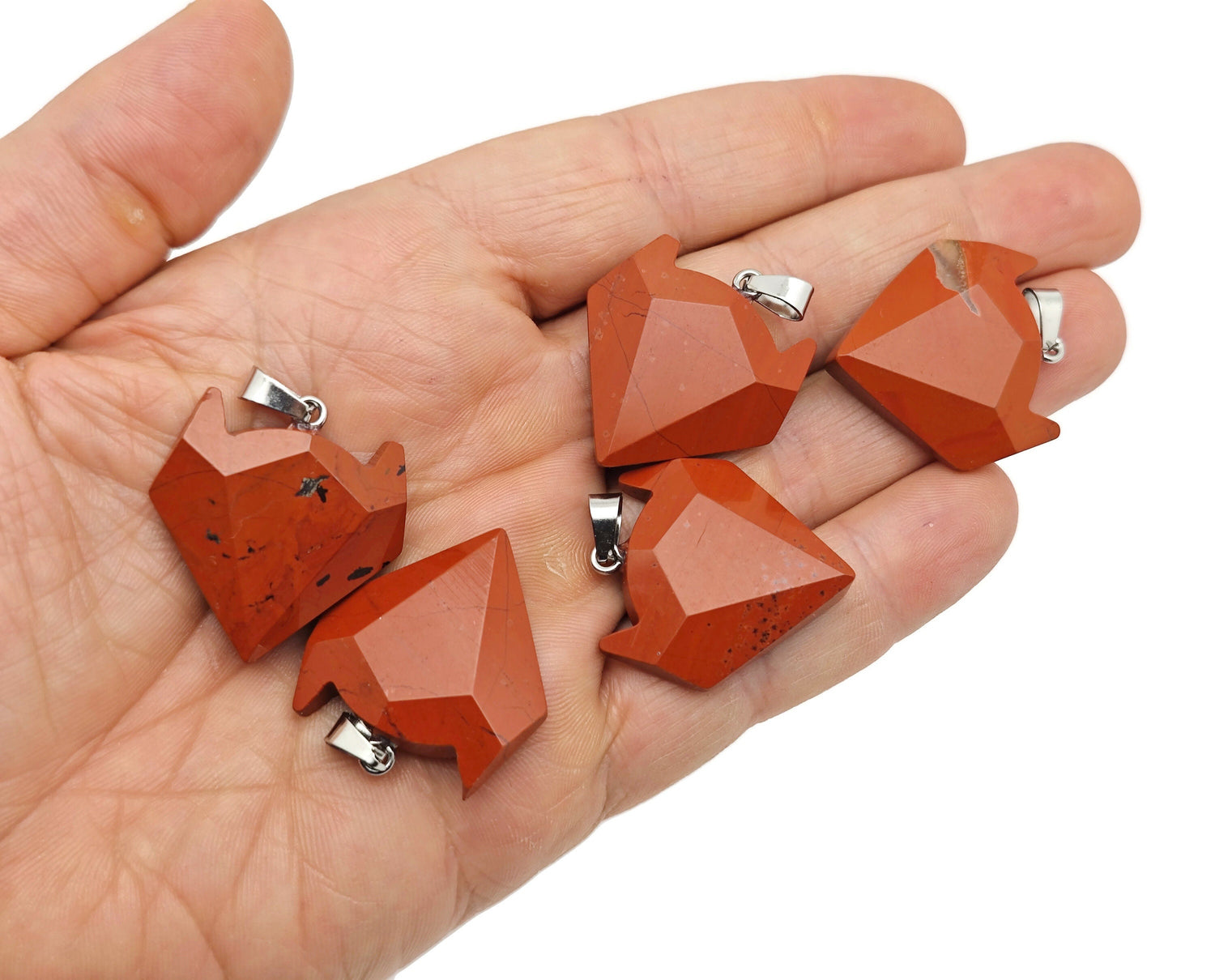 Red Jasper wolf head gemstone pendant from GemstoneGO featuring a detailed wolf design in vibrant red jasper crystal jewelry.