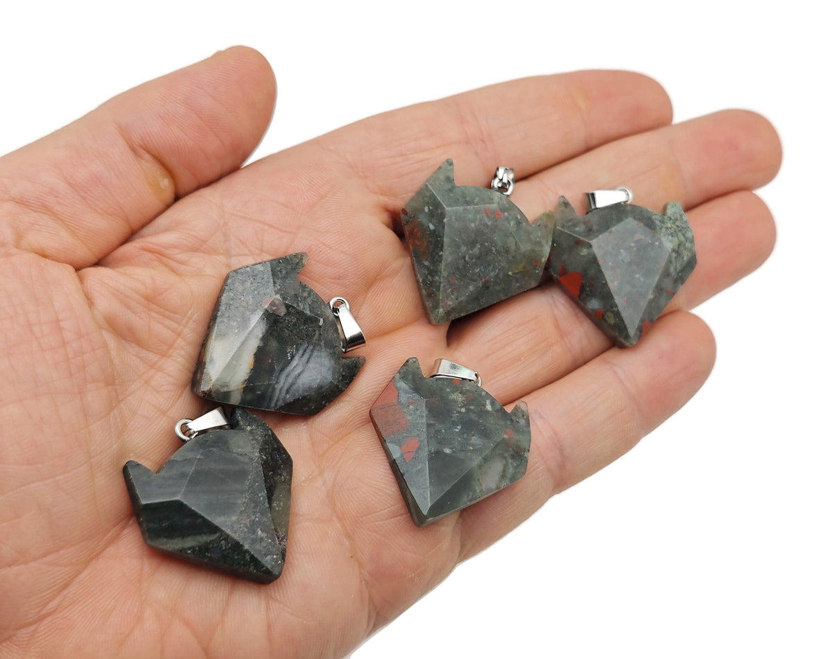 African Bloodstone wolf head gemstone pendant featuring a striking crystal design, crafted by GemstoneGO.