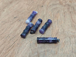 Amethyst bamboo-shaped crystal pendant from GemstoneGO, featuring a protective amethyst gemstone with intricate bamboo design.