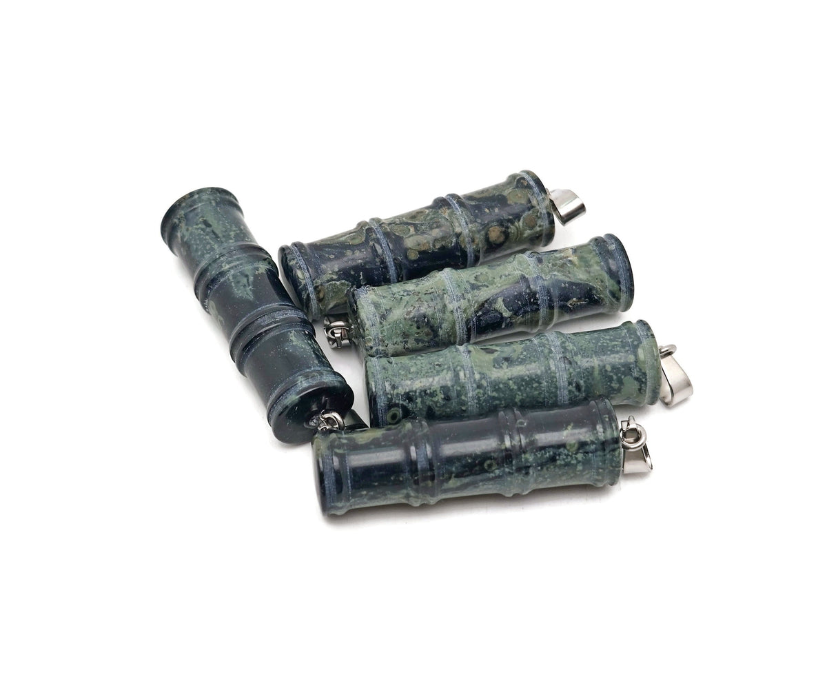 Kambaba Jasper bamboo-shaped crystal pendant from GemstoneGO featuring a protective crystal design and natural stone details.