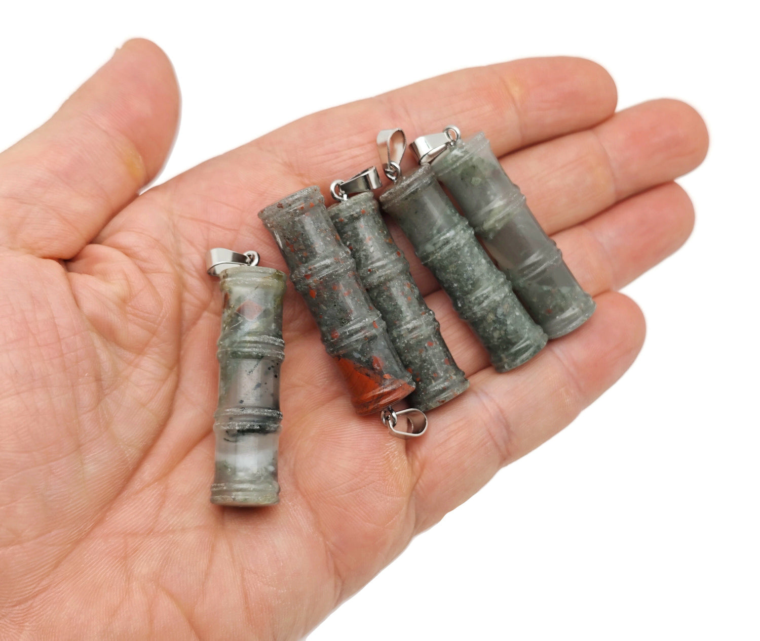 African Bloodstone bamboo-shaped crystal pendant with protective energy, featuring a natural bloodstone gemstone on a sleek cord.