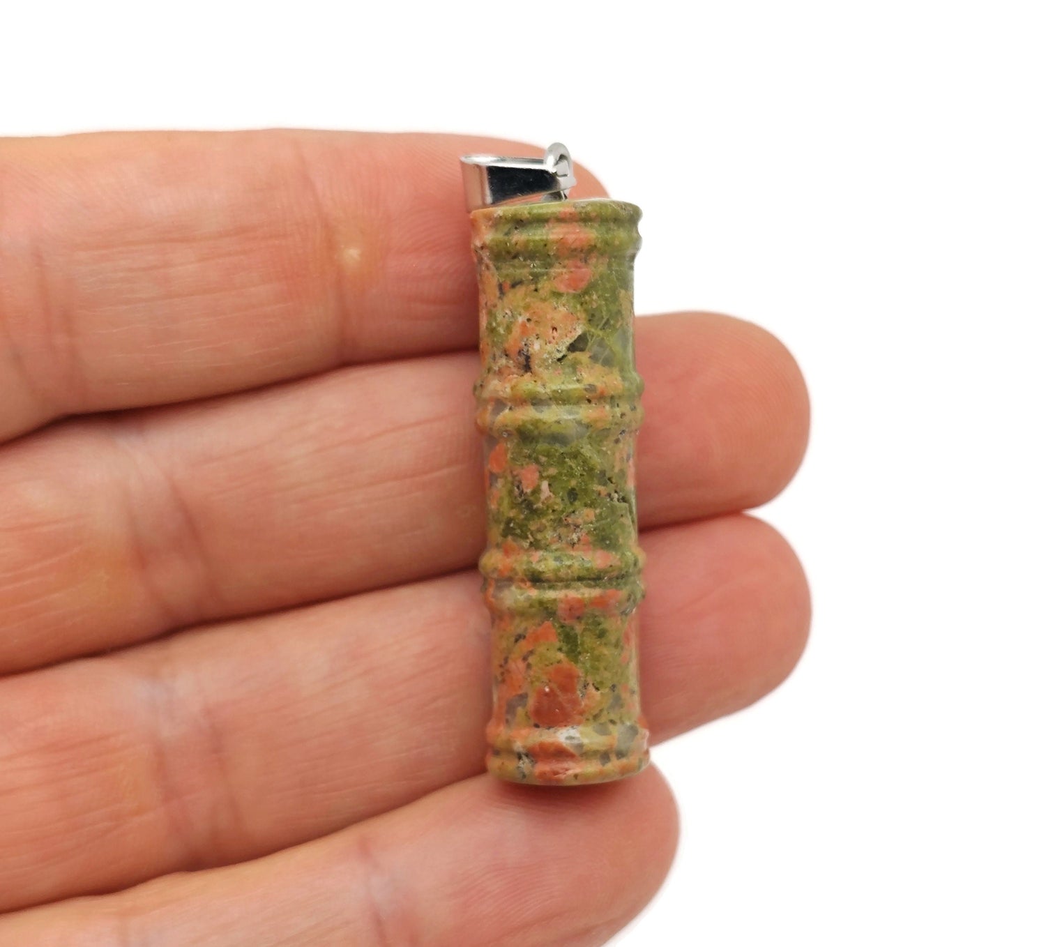 Unakite bamboo-shaped crystal pendant from GemstoneGO, featuring a protective healing crystal with natural green and pink hues.
