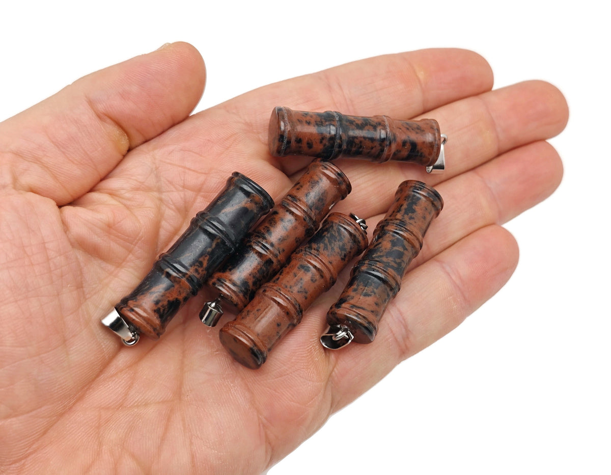 Mahogany Obsidian crystal pendant with bamboo shape design, featuring protective energy, from GemstoneGO.