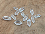 Clear Quartz double terminated point wand from GemstoneGO with natural crystal clarity and polished surface.