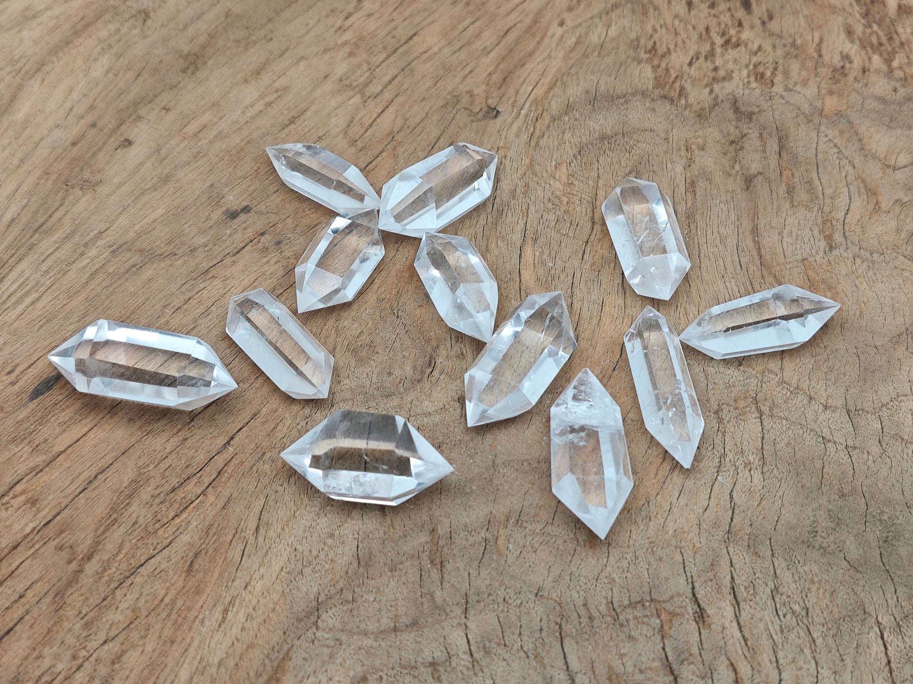 Clear Quartz double terminated point wand from GemstoneGO with natural crystal clarity and polished surface.