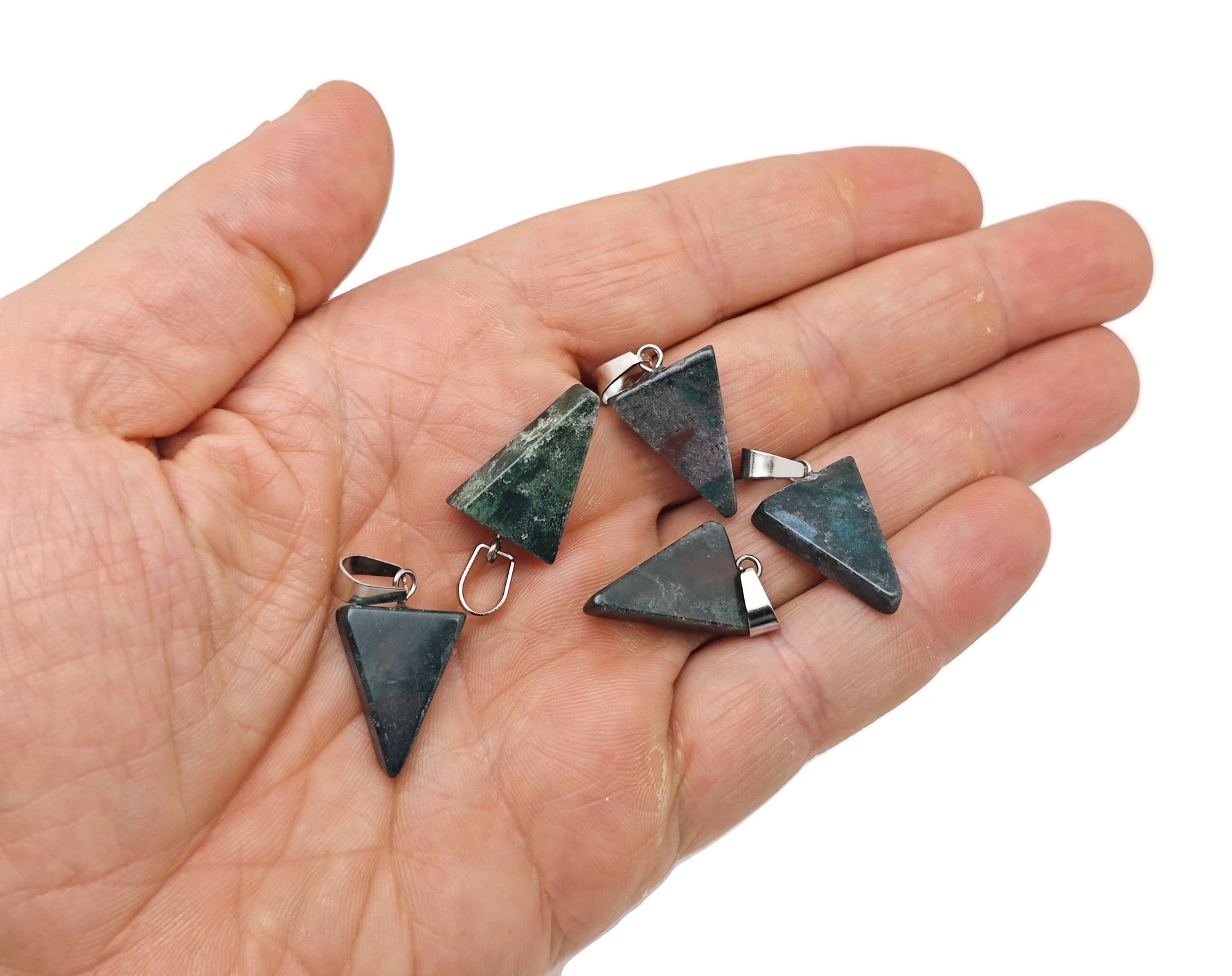 Triangle-shaped crystal pendant from GemstoneGO, ideal for jewelry making, shown in a close-up view of the faceted gemstone.