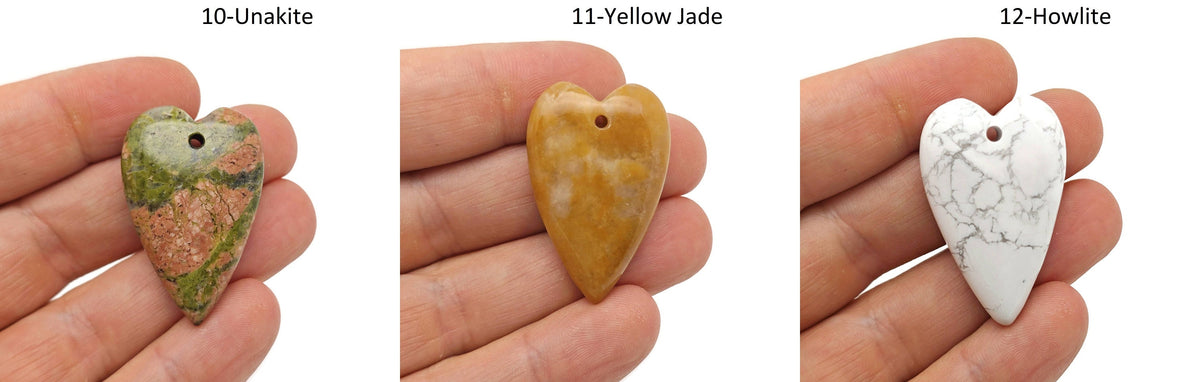 Long heart-shaped love crystal pendant featuring a large gemstone with a sharp heart design, perfect for healing and elegance.