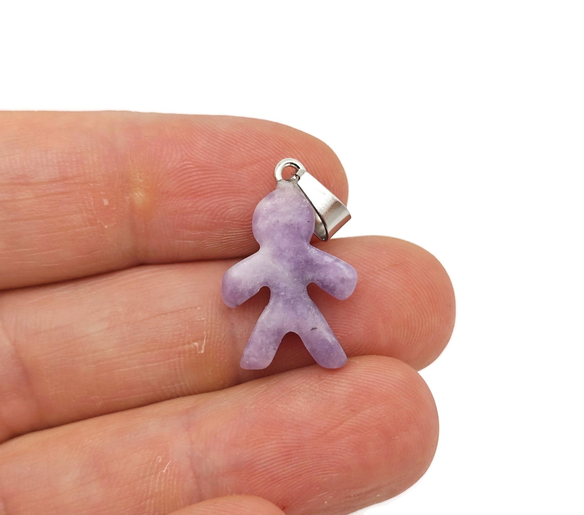 Lepidolite gingerbread cookie-shaped crystal pendant from GemstoneGO, featuring mineral specimen details and a festive design.