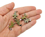 Unakite gingerbread cookies men crystal pendant from GemstoneGO, showcasing a colorful mineral specimen with gingerbread shape.