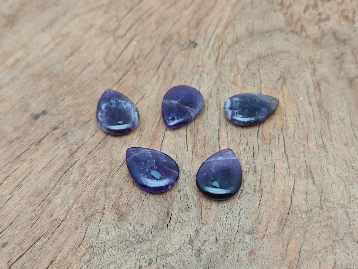 Dainty amethyst drop crystal pendant from GemstoneGO, ideal for DIY jewelry making, showcasing a purple gemstone pendant on a silver chain