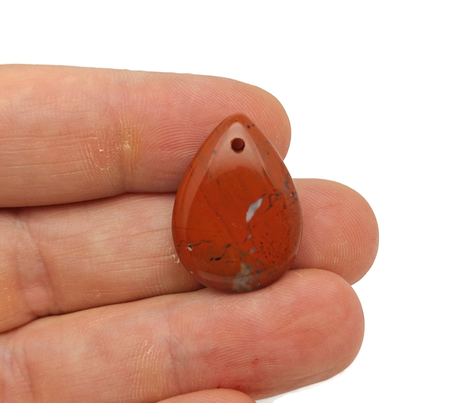 Red Jasper dainty drop crystal pendant for DIY jewelry making, featuring a polished red jasper stone and delicate silver chain.