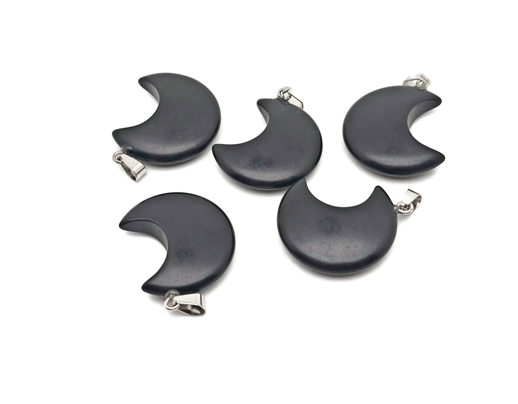 Obsidian Moon gemstone pendant featuring a crescent moon design from GemstoneGO, showcasing a polished black obsidian stone.