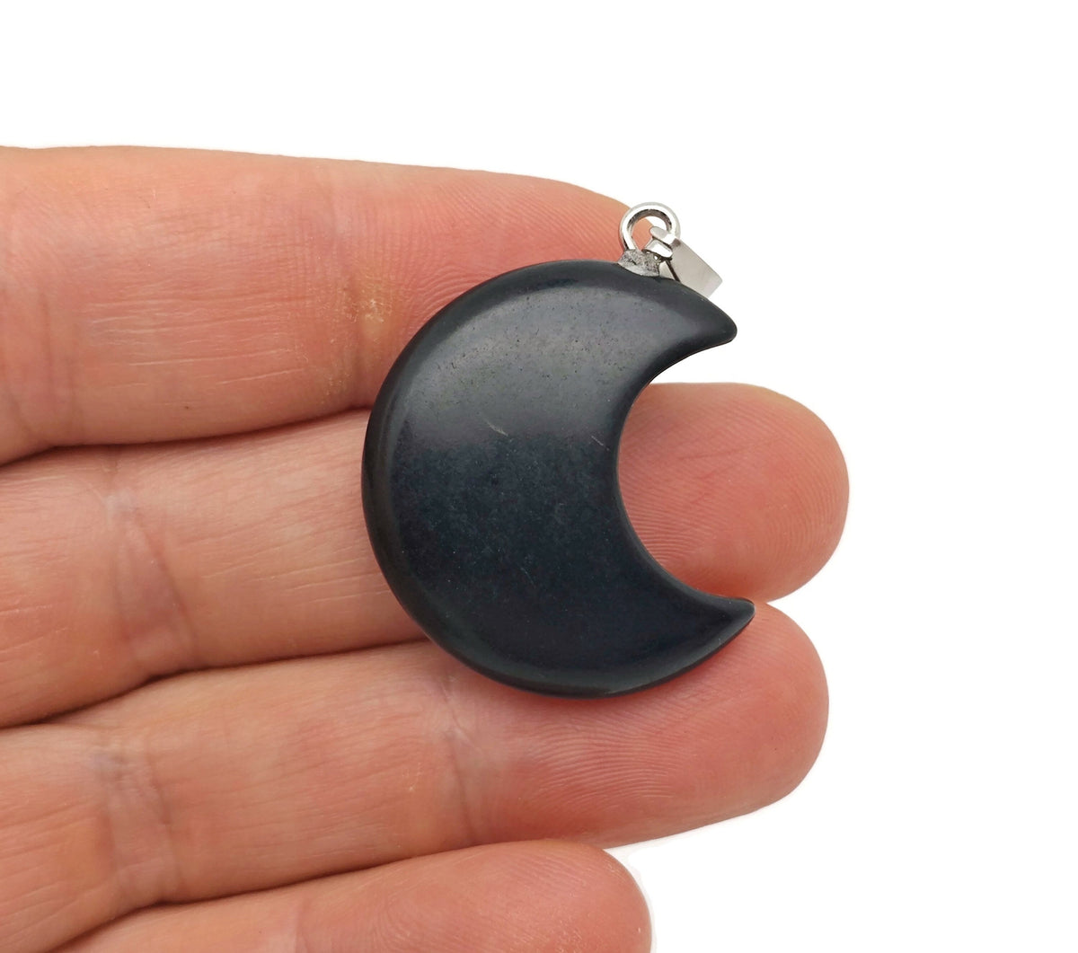Obsidian moon gemstone pendant featuring a crescent moon design from GemstoneGO, showcasing smooth black polished stone.