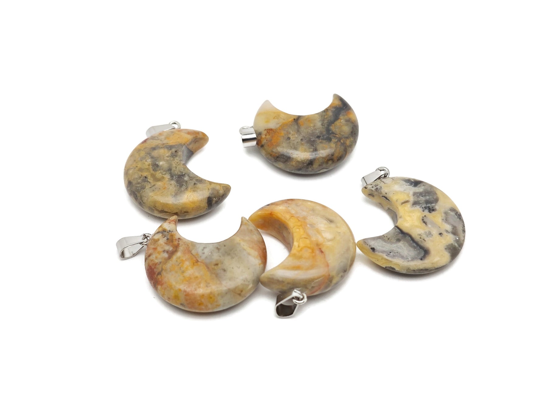 Crazy Lace Agate moon gemstone pendant featuring a crescent moon design from GemstoneGO, showcasing vibrant, intricate stone details.