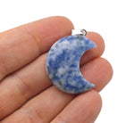 Blue Spot Jasper crescent moon pendant featuring a polished gemstone, designed by GemstoneGO.
