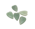 A large aventurine heart-shaped crystal pendant with a polished gemstone, featuring a sharp, well-defined heart design.