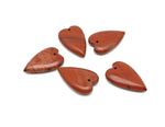 Red Jasper long heart-shaped love crystal pendant from GemstoneGO, featuring a vibrant heart-shaped healing gemstone.