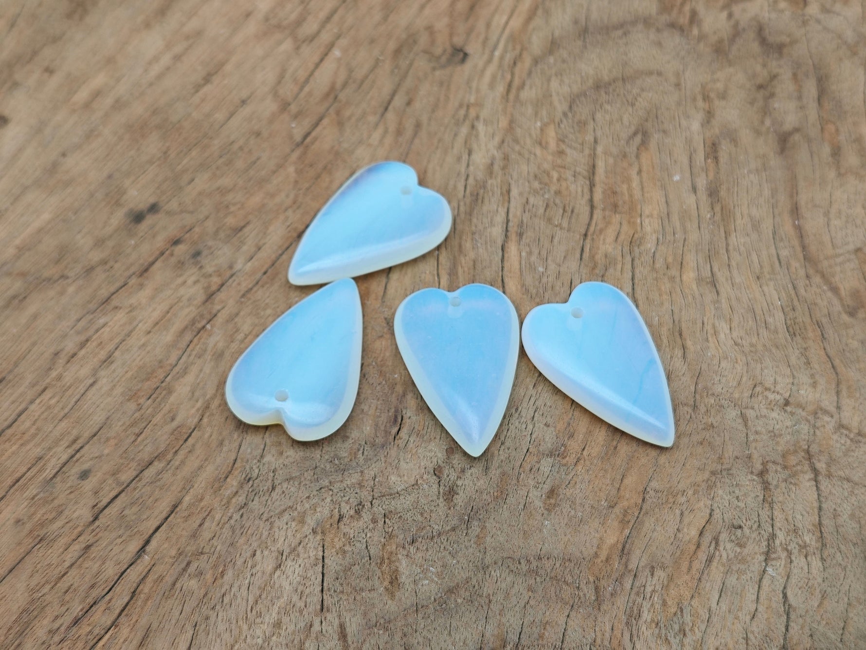 Opalite long heart-shaped love crystal pendant featuring a healing gemstone design, crafted by GemstoneGO.