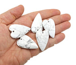 Heart-shaped Howlite love crystal pendant featuring a polished healing gemstone, perfect for jewelry and spiritual adornment.