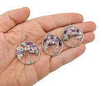 Fluorite Tree of Life gemstone pendant from GemstoneGO featuring vibrant green and purple fluorite crystals on a metal branch.