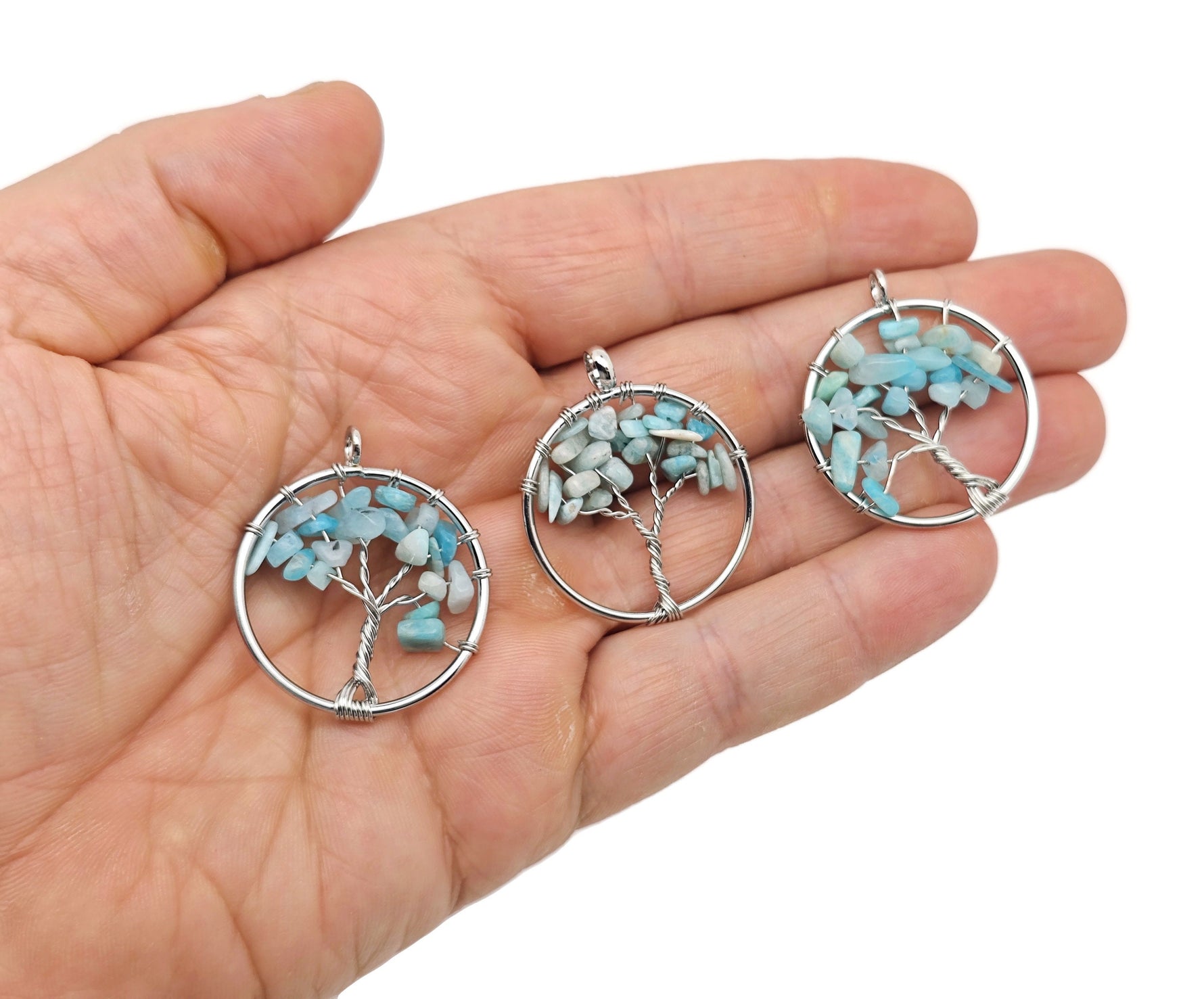 Amazonite Tree of Life gemstone pendant featuring a detailed tree design, perfect for jewelry or spiritual accessories by GemstoneGO.