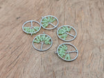 Peridot olive tree of life gemstone pendant by GemstoneGO featuring a detailed tree design with green peridot stones.