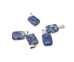 Sodalite rectangle-shaped crystal pendant from GemstoneGO, showcasing deep blue stone with natural veining, ideal for jewelry making.