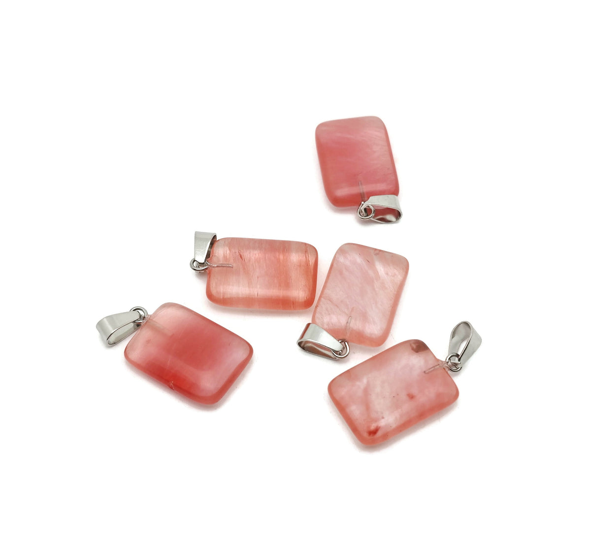 Cherry quartz rectangle crystal pendant from GemstoneGO, showcasing a vibrant red gemstone with a polished rectangular shape.
