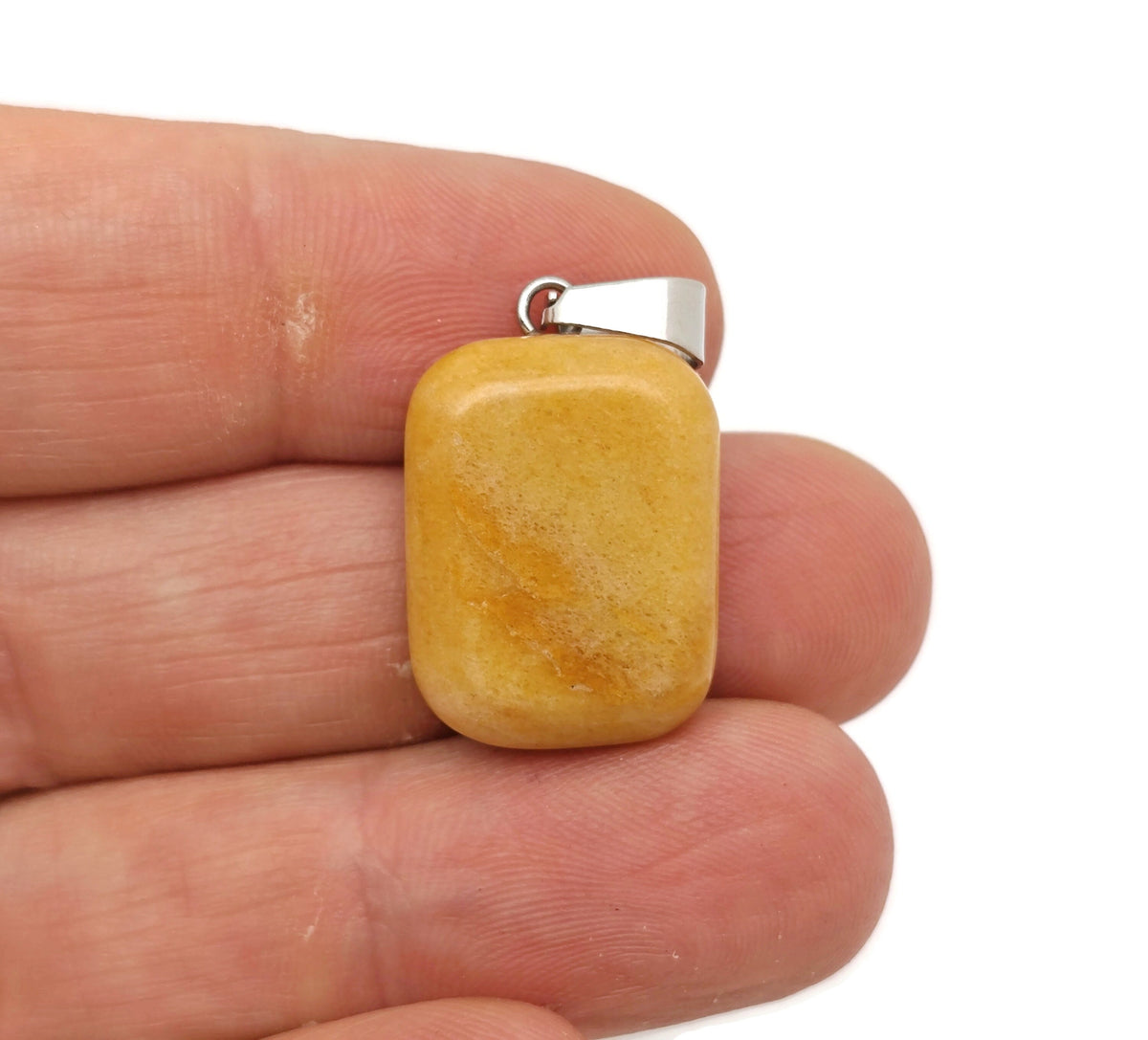 Yellow jade rectangle crystal pendant from GemstoneGO, showcasing a smooth, polished gemstone with a vibrant yellow hue and rectangular shape.