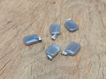 Grey agate rectangle-shaped crystal pendant from GemstoneGO, showcasing the polished stone with natural banding and smooth edges.