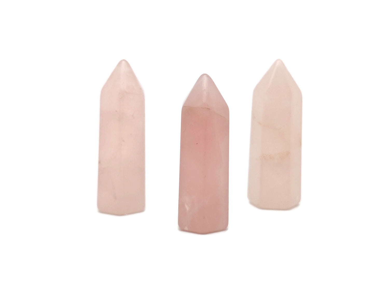 Rose Quartz obelisk tower crystal, 40mm gemstone with pink hue, from GemstoneGO, showcasing smooth polished surface and natural veining.