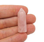 Pink rose quartz obelisk tower crystal, 40mm gemstone from GemstoneGO, showcasing a polished pointed crystal structure.